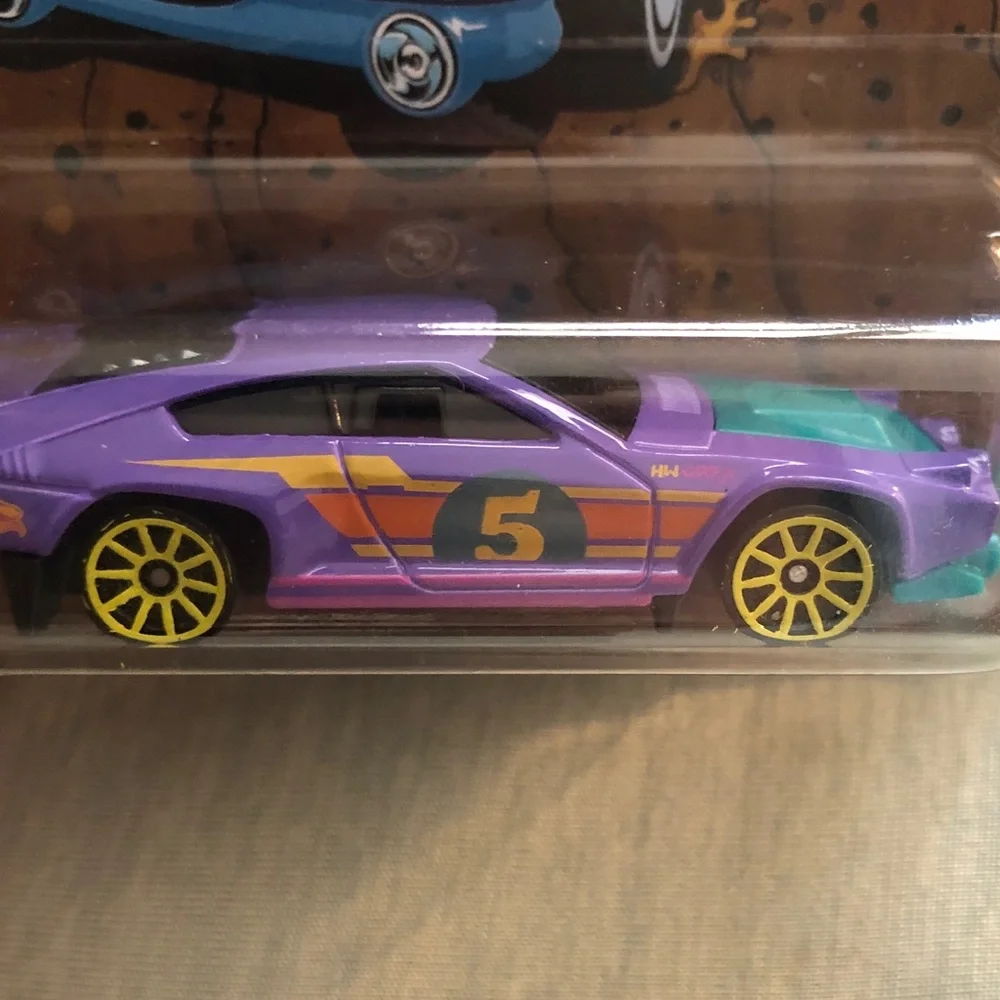 Mattel Hot Wheels Dimachinni Veloce Toy Car - Purple and Yellow
